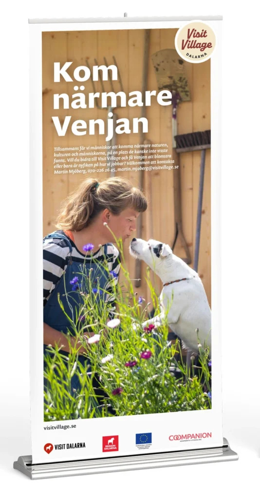 Rollup med Visit village budskap